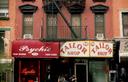 Only in the East Village could you find the Psychic and the Tailor next door to one another.